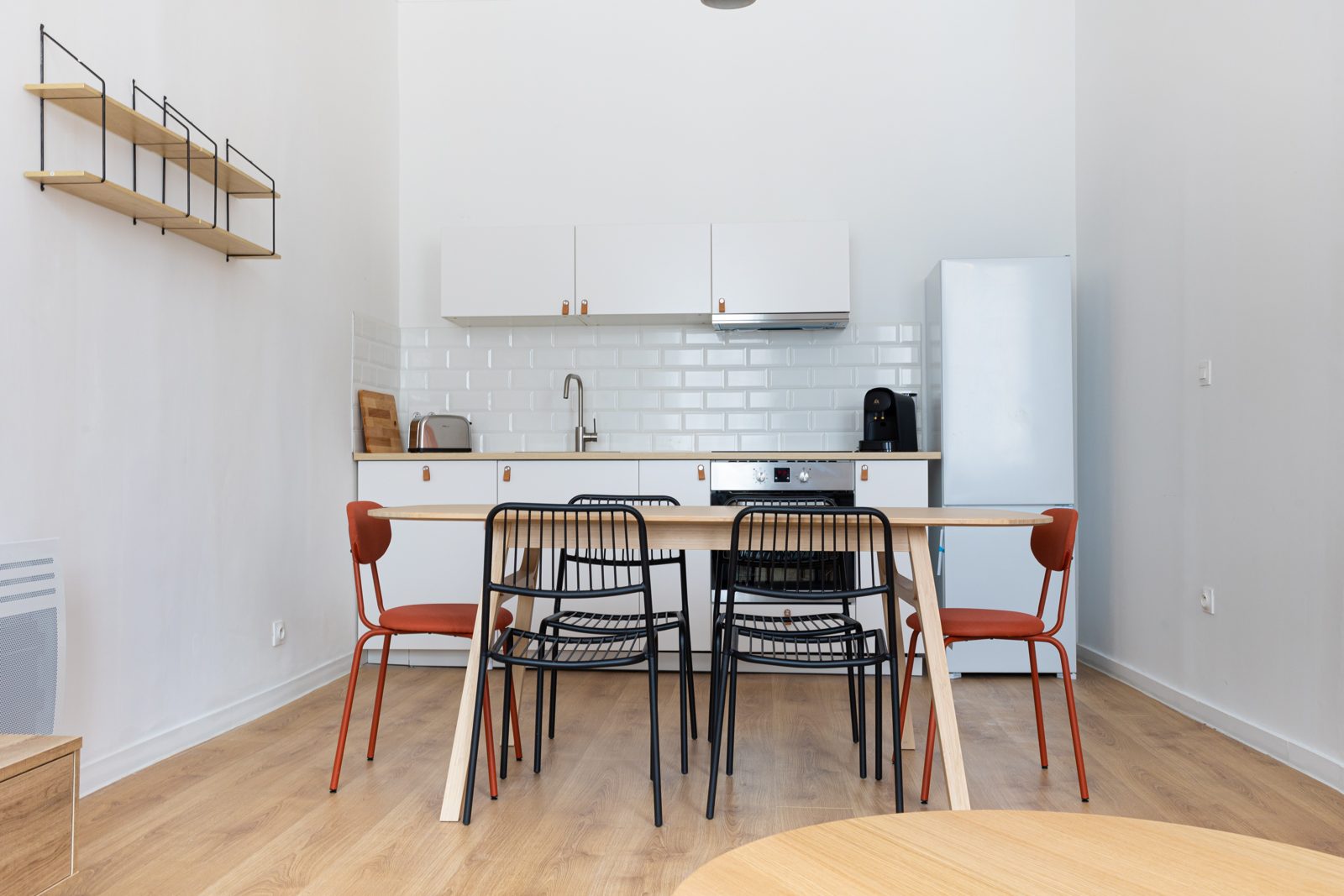 Coin repas d'un appartement meublé — réalisation Expat' Immo
